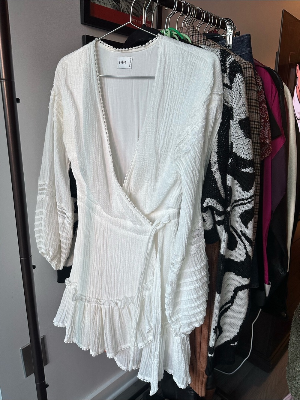 White Wrap-Front Women's Top with Ruffle Hem